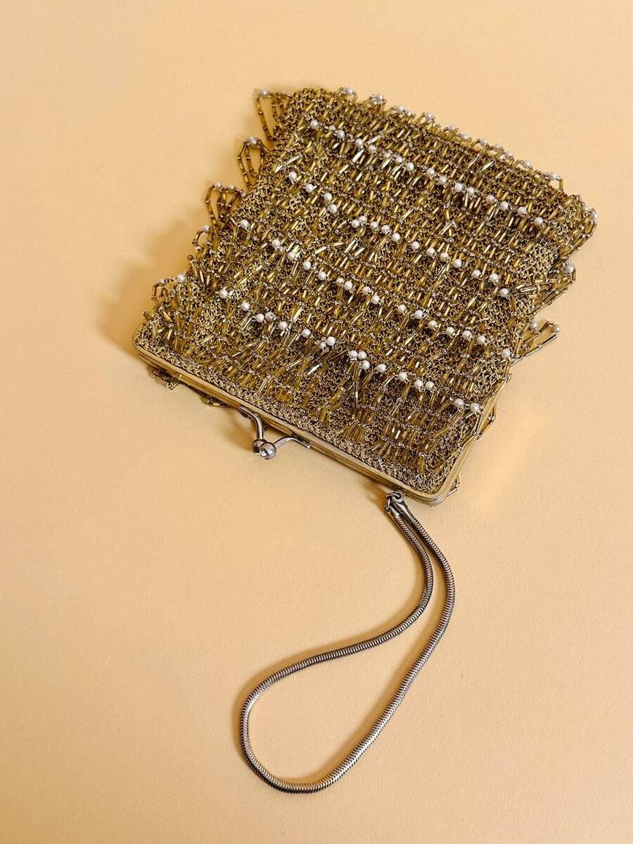 bl mini bag in crochet oro con mticrofrange di perline 24