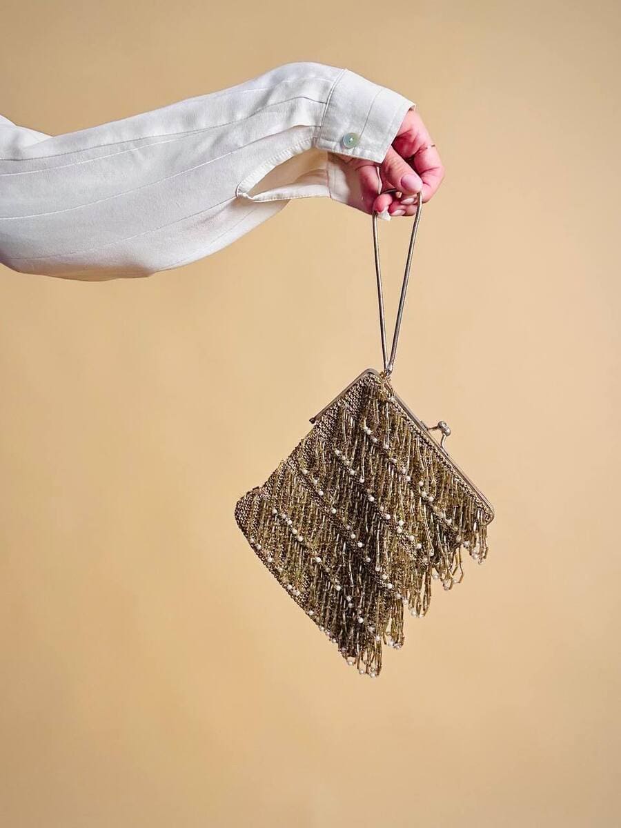 bl mini bag in crochet oro con mticrofrange di perline 23